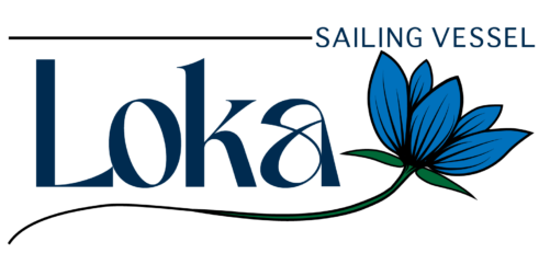 a horizontal line from top left to middle of screen, ending in "sailing vessel". below that, the word Loka is in a fun font with a blue lotus flower arching across to the right of the name "loka"